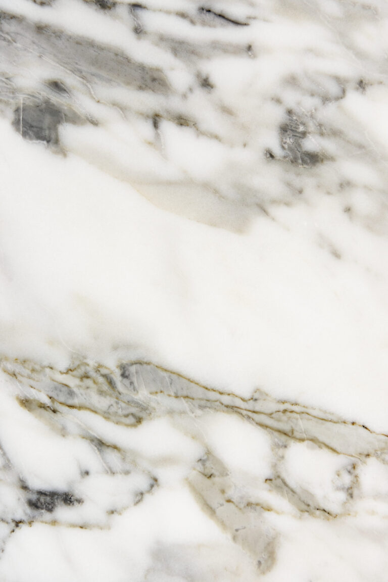 Close up of a white marble textured wall
