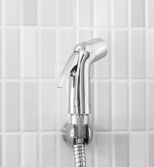 sanitary ware on white wall background in toilet